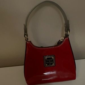 Tiny patent red Genuine Dooney
